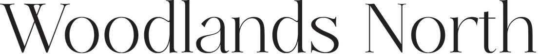 The Woodlands Apartments logo